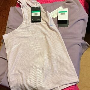 Nike Women's Light Purple Tank and 7/8 length leggings